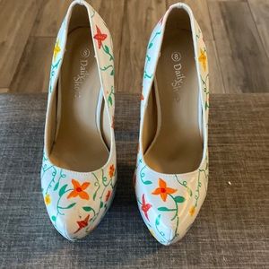 White flowery platform heels